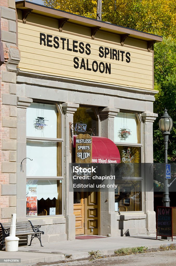 Restless Spirits Saloon in Lake City Lake City, United States - October 11, 2014: Lake City, Colorado is a colorful old mining town situated in the middle of the Rocky Mountains.  Many of its buildings retain their historic facades, like the Restless Spirits Saloon.  You might just think you've walked onto a Wild West movie set when visiting! 2015 Stock Photo