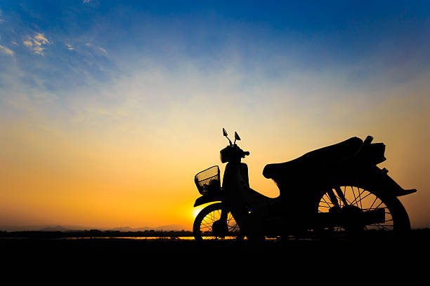 istock Beautiful landscape image with vintage Motorcycle at sunset 469432872