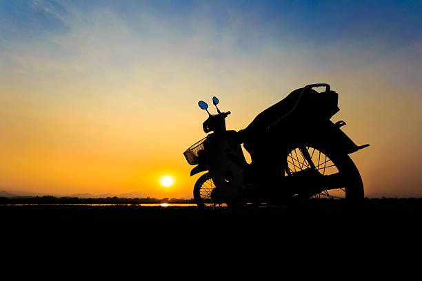 istock Beautiful landscape image with vintage Motorcycle at sunset 469433396