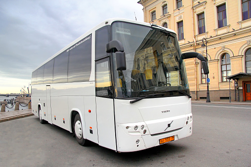 Saint Petersburg, Russia - May 26, 2013: White Volvo 9900 interurban coach parked at the city street.