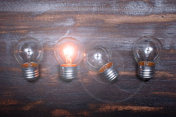 istock Lamp on wood blackground. 469433776