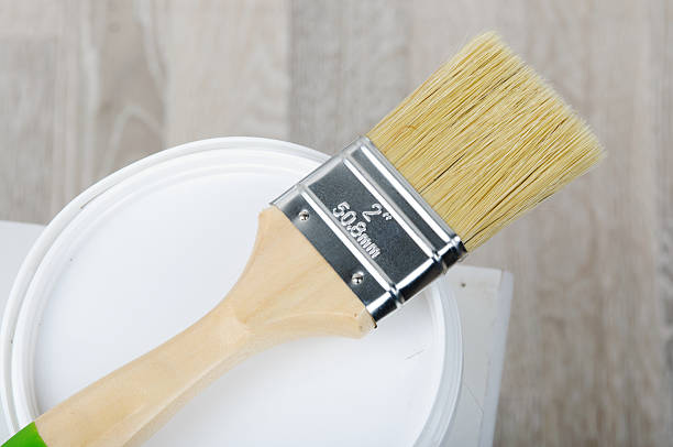 istock paintbrush with bucket 469440562