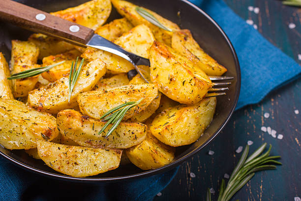 istock Oven Baked potatoes with herbs 469441542