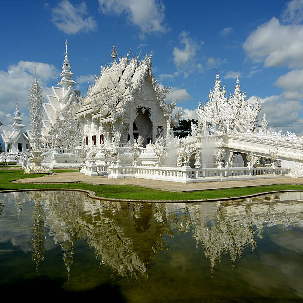 istock Thailand White Temple Chiang Rai Province and reflection on water 469441846