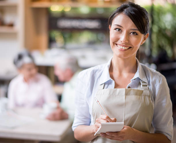 istock Waitress at a coffee shop 469444648