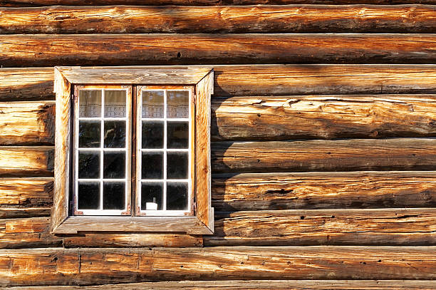 istock Norwegian wall of logs with window 469445458