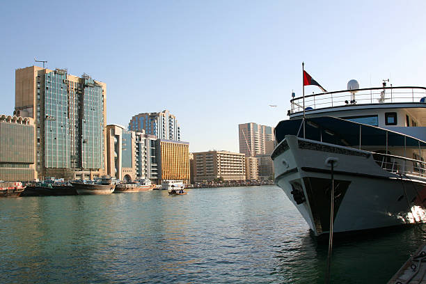 istock Dubai Creek view with modern boat moored at water's edge 469446802