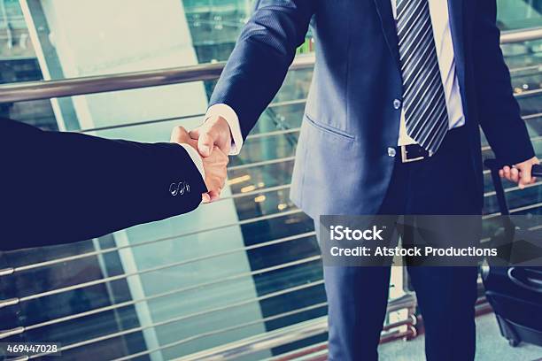 Handshake Of Businessman At The Airport Business Travel Concept Stock Photo - Download Image Now