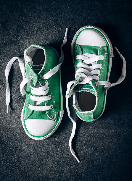 istock Green child sneakers 469451974