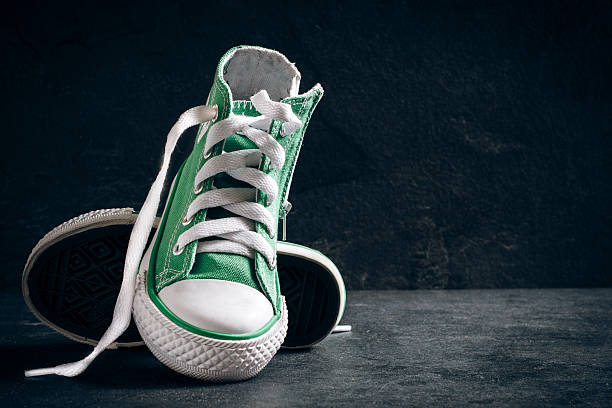 istock Fashionable sneakers and blank space 469454468