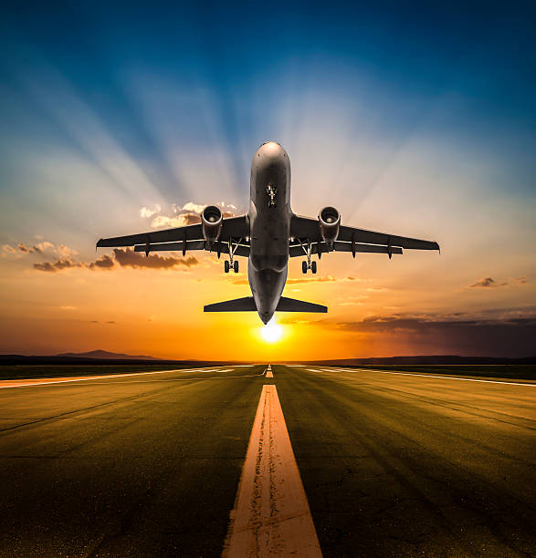 istock Passenger airplane taking off at sunset 469454854