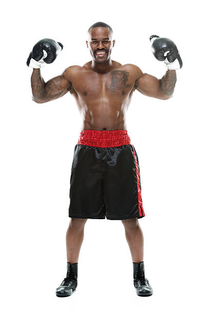 улыбающаяся мышечная боксер, чтобы отметить свои успехи - shirtless professional sport cheerful front view стоковые фото и изображения