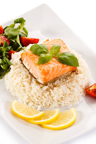istock Grilled salmon, white rice and vegetables 469457264