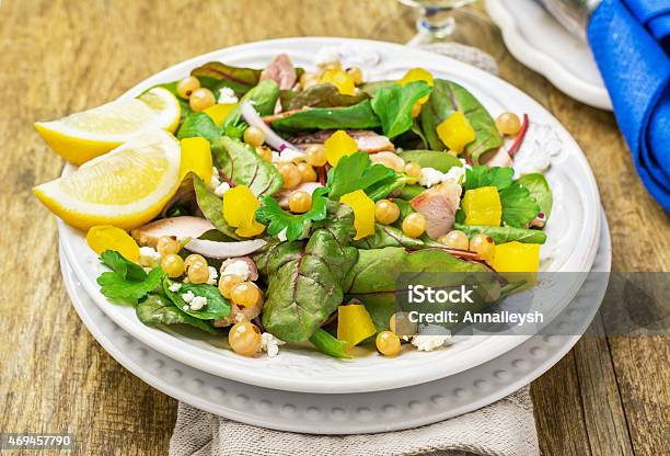 Assorted Salad With Arugula Spinach Chard Chicken White Currant Berries Stock Photo - Download Image Now