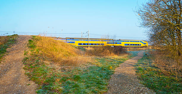 istock Railroad through the countryside in winter 469465950