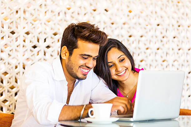 istock Indian couple sitting in cafe 469467090