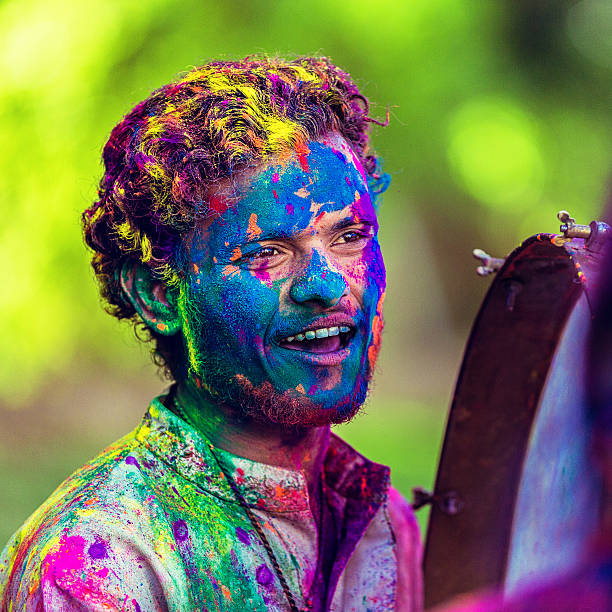 istock Colourful Indian Man Celebrating Holi 469467134