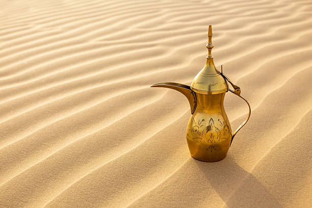 istock Arabic Coffee Pot on Desert Dunes 469467158