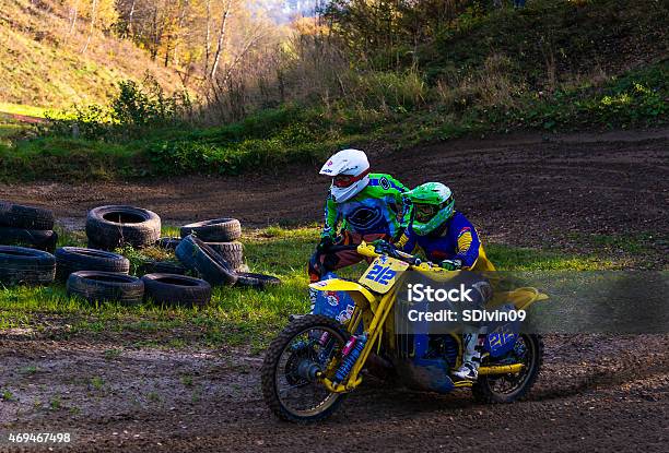 Motorcycle Racers On Motorcycles With Sidecars Overcome The Tra Stock Photo - Download Image Now