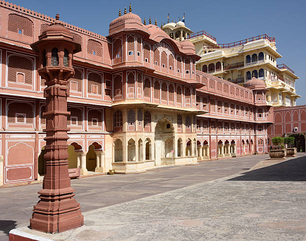 The City Palace, Jaipur, Rajasthan, India, is a palace complex which includes the Chandra Mahal and Mubarak Mahal palaces and other buildings. It was formerly the seat of the Maharaja of Jaipur. The Chandra Mahal palace, the cream-coloured building in the image, now houses a museum although the greater part of it is still a royal residence. The palace was built between 1729 and 1732, initially by Sawai Jai Singh II, the ruler of Amber and is a fusion of Indian architecture with Mughal and European styles.