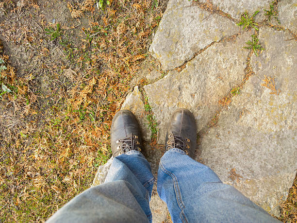 istock Feet on the paving stone 469471044