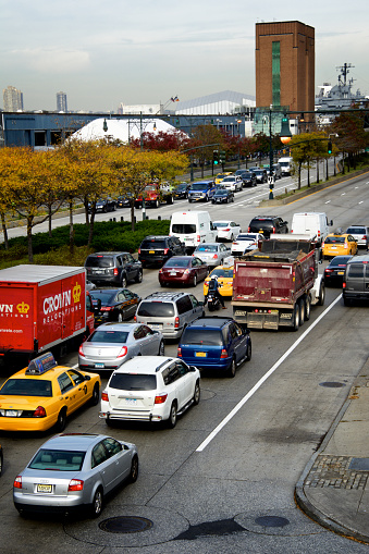 New York City, USA - October 28, 2014: Rows of vehicles stopped along 12th Avenue in the West Side of Manhattan at W.34th Street.