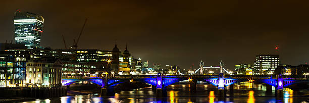 Panorama of Southwark bridge at night