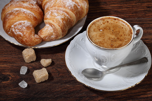 Cappuccino coffee with croissants