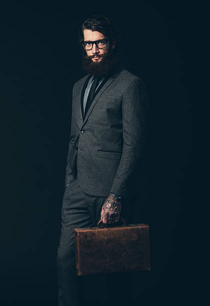 istock Businessman With Eyeglasses Holding his Briefcase 469477238