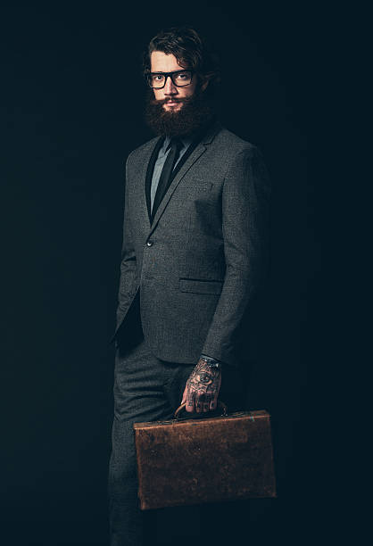 istock Man in Formal Business Suit Holding his Briefcase 469477244