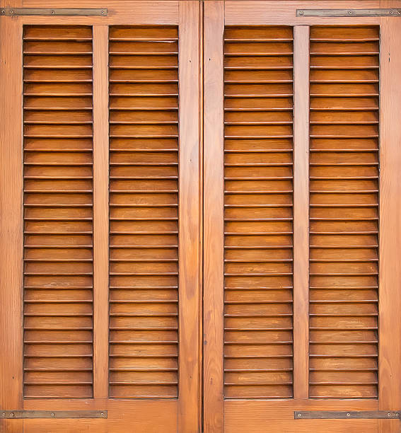 istock Window with brown shutters. Close-up view. 469477454