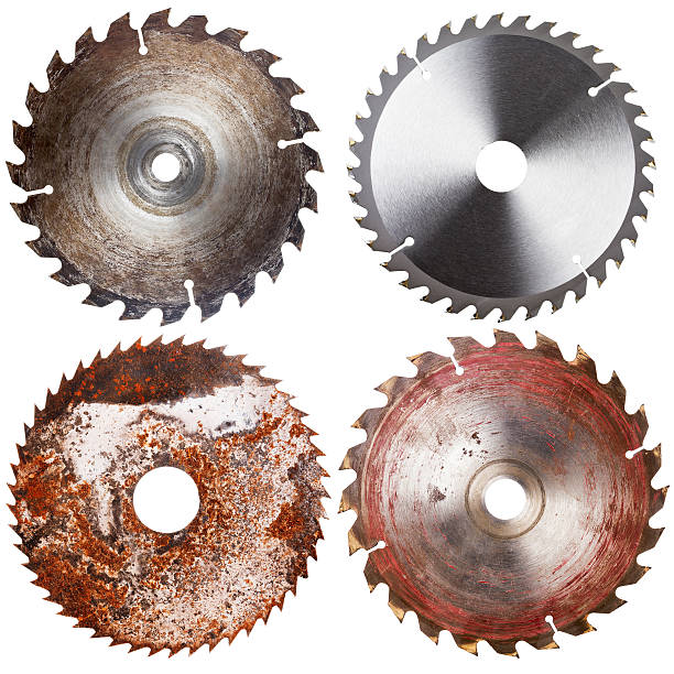 Set of circular saw blades Set of four circular saw blades isolated on white background rotary blade stock pictures, royalty-free photos & images