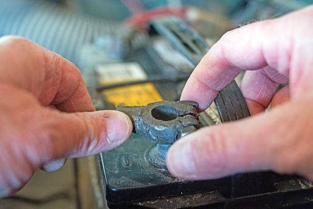 istock Removing a car batterry cable close-up 469488384