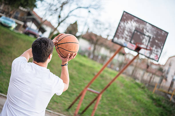 istock Man shooting at the hoop 469502610