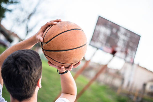 istock Man shooting at the hoop 469502612