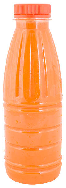 istock bottle of fresh juice carrots. blank bottle. 469503328