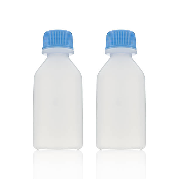 istock bottles and other liquid isolated on white 469505051
