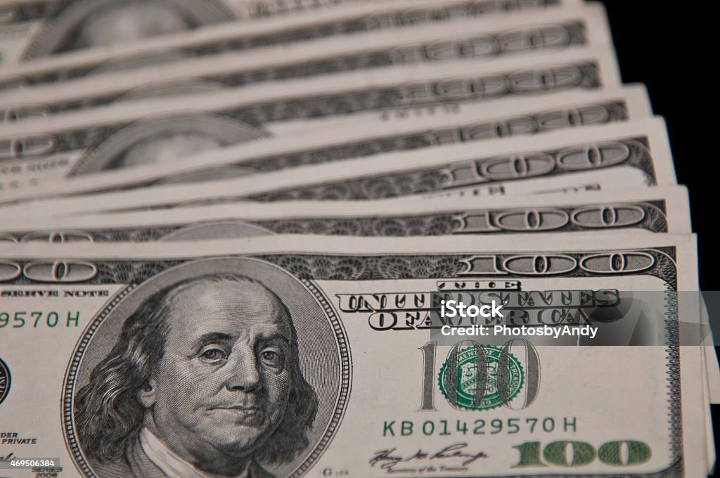 Closeup of $100 dollar bills Detailed view of one hundred dollar bills 2015 Stock Photo