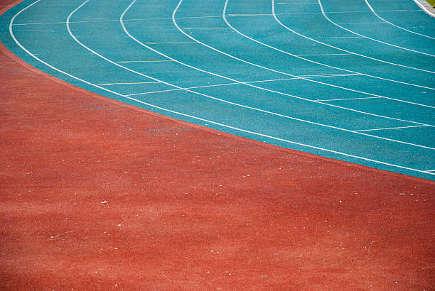 istock green and red plastic runway in a sports ground 469507863