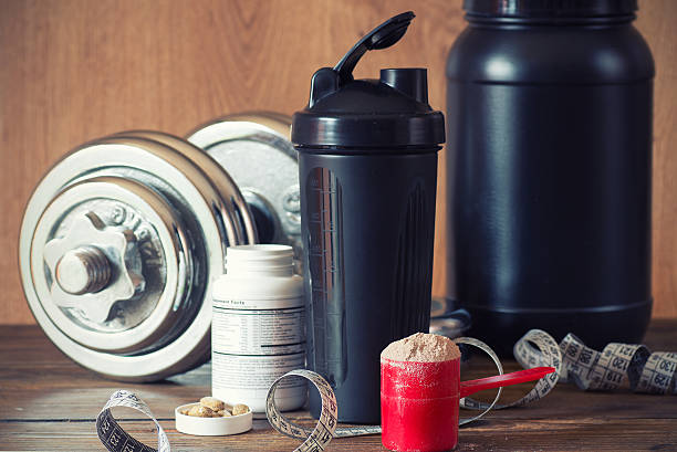 proteínas de suero de leche en polvo - protein concentrate fotografías e imágenes de stock