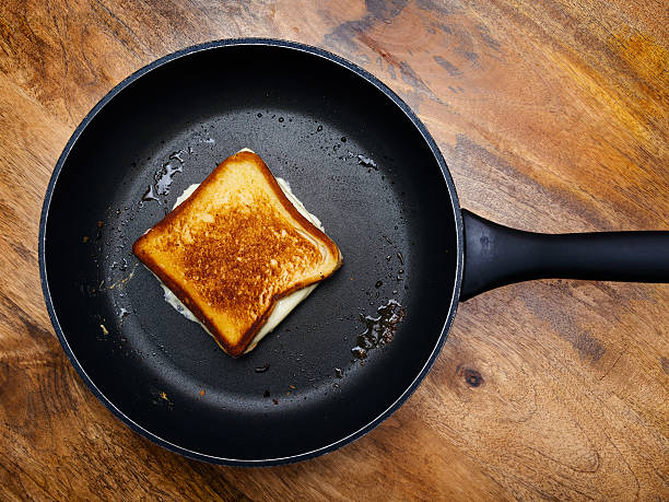 Grilled Cheese Sandwich Stock Photo - Download Image Now - Cheese Sandwich,  Toasted Bread, Frying Pan - iStock
