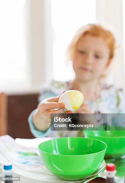 Dyeing Easter Eggs Stock Photo - Download Image Now - 2015, 6-7 Years, Activity