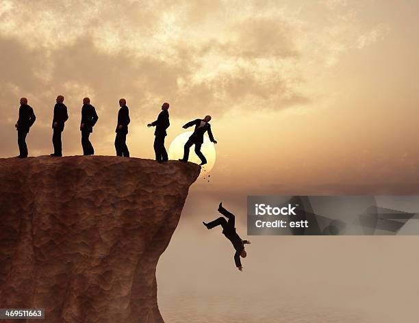 Men On A Cliff Stock Photo - Download Image Now - Cliff, Falling, In Silhouette
