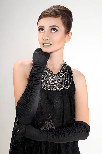 istock beautiful young woman in retro style 469516351