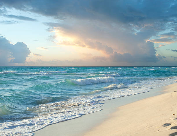istock Morning storm clouds over beach on Caribbean Sea 469516583