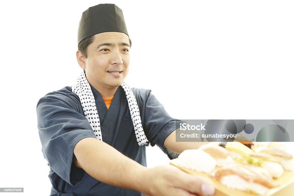 Portrait of a sushi chef Portrait of a sushi chef isolated on white background Adult Stock Photo