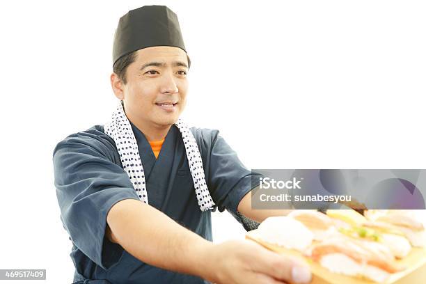 Portrait Of A Sushi Chef Stock Photo - Download Image Now - Adult, Business, Carrying