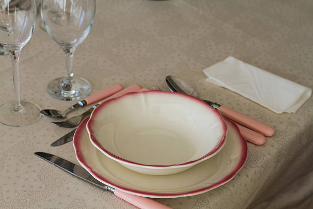 istock Table with tablecloth, plate, cutlery, glassware and napkin, rea 469525873