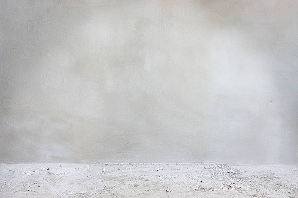 istock white concrete wall and floor closeup 469525936