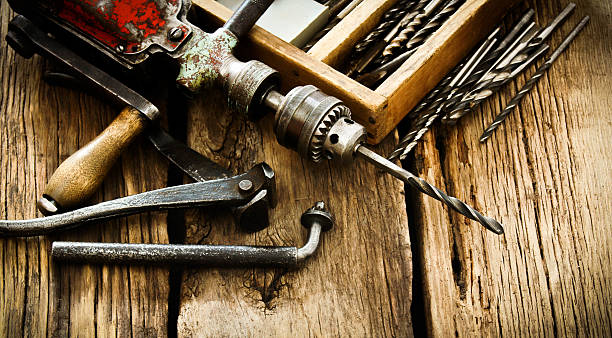 istock Old drill, a box with drills, pliers and ruler on 469529734